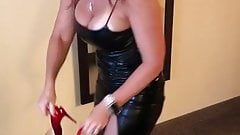 MILF Janet Mason shows off tight leather dress