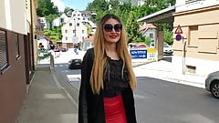 Sexy Blond Lady with Tight Red Leather Skirt and High- Boots