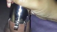 Wife forcing husband’s hard cock into chastity cage