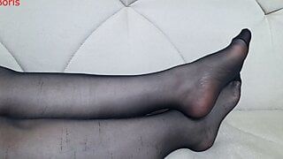 From another point of view, Anna’s black pantyhose, legs and feet.